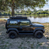 Tente de toit Kyvyk Keeper XS sur un 4x4 Suzuki Jimny