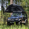 Tente de toit Kyvyk Keeper XS ouverte sur un 4x4 Suzuki Samurai